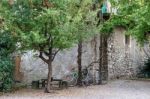 Bicycles Parked In A Courtyard In Sarnico Stock Photo