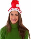 Happy Young Woman Wearing Santa Hat Stock Photo