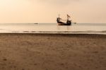 Fishing Boat Is Floating On The Sea Stock Photo