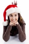 Lying Female Wearing Santa Hat Stock Photo