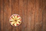 Top View Of Sliced Apple On Wooden Background Stock Photo