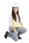 Smiling Young Lady Wearing Hard Hat Stock Photo