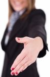 Business Women Offering A Hand Shake Stock Photo