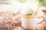 Abstract Coffee And Carpenter Tools In Pine Wood Table Stock Photo