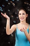 Girl And Soap Bubbles Stock Photo