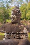 Statue Of Ancient Khmer Warrior Head At Angkor Wat Stock Photo