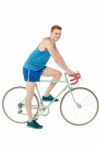 A Young Male Bicyclist Riding A Bicycle Stock Photo