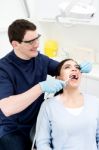 Treatment Of Patient At Dental Clinic Stock Photo