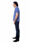 Side Pose Of Smart Young Man, Studio Shot Stock Photo