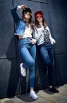 Young Beautiful Girls With Denim Suit In A Urban Background Stock Photo