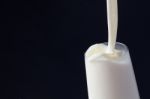 White Milk In Glass Stock Photo