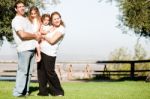 Family Posing For Picture Stock Photo