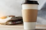 Cup Of Coffee On Desk Stock Photo