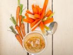 Fresh Hummus Dip With Raw Carrot And Celery Stock Photo