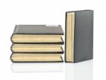 Black Hardcover Book On White Glossy Background Stock Photo