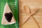 Crepe Cake On Banana Leaf Plate And Wooden Fork Stock Photo