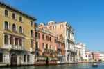 Motorboat Cruising Down The Grand Canal In Venice Stock Photo