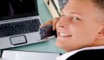 Male Executive Talking Over Phone Stock Photo