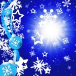 Blue Snowflakes Background Shows Bright Sun And Snowing
 Stock Photo