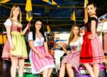 Gorgeous Young Women At German Funfair Stock Photo