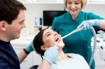 Young Woman At The Dentist Stock Photo