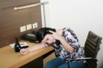 Portrait Of Secretary Falling Asleep Stock Photo