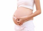 Pregnancy And Tapeline Abdomen On White Background Stock Photo