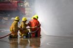 Fireman. Firefighters Fighting Fire During Training Stock Photo