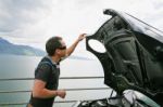 Man Checking His Car Stock Photo