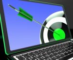 Dartboard On Laptop Showing Precise Aiming Stock Photo