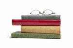 Glasses on Old Books Stock Photo