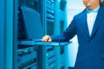 Man Fix Server Network In Data Center Room Stock Photo