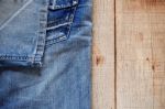 Jeans On The Old Wooden Stock Photo