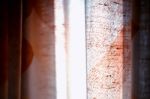 Horizontal Vivid Brown Curtain Bokeh Background Stock Photo