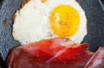 Egg Sunny Side Up With Italian Speck Ham Stock Photo