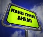 Hard Times Ahead Signpost Means Tough Hardship And Difficulties Stock Photo