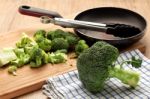 Broccoli On Kitchen Table Stock Photo