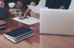 Woman Standing And Writing Document Hand Close Up At Desk Stock Photo