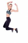 Jumping Athletic Woman Stock Photo