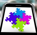 Puzzle Square On Smartphone Shows Unity Stock Photo