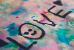 The Word Love Painted With Water Colors Stock Photo