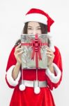 Santa Claus Hat With Grey Christmas Gift Box Stock Photo