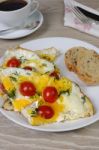 Scrambled Eggs With Tomatoes Stock Photo