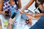 Portrait Of Group Friends Having Fun With Smartphones Stock Photo