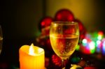 Two Glasses Of Champagne With A Christmas Decor In The Background Stock Photo