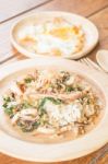 Rice Topped With Stir-fried Squid Basil And Fried Egg (thai Food Stock Photo