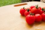 Cherry Tomato Fresh Group On Wooden Chopping Board Stock Photo