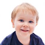 Toddler Blond And Blue Eyes Boy Stock Photo