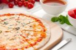 Italian Original Thin Crust Pizza Stock Photo