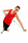 Girl Exercising With Elastic Fitness Band Stock Photo